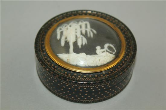 A 19th century green lacquered gold pique work circular snuff box, 3in.